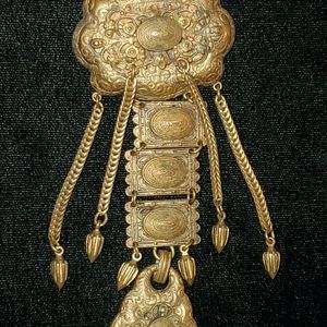 Vintage brass Etruscan Style hanging brooch
